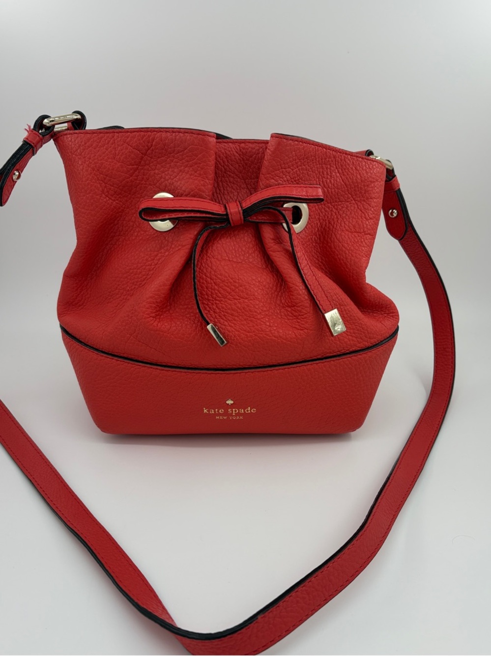 kate spade Red Pebbled Leather Drawstring Bucket Crossbody Bag